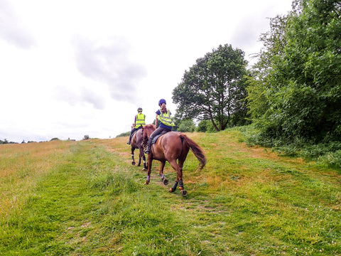 Two women horse riding