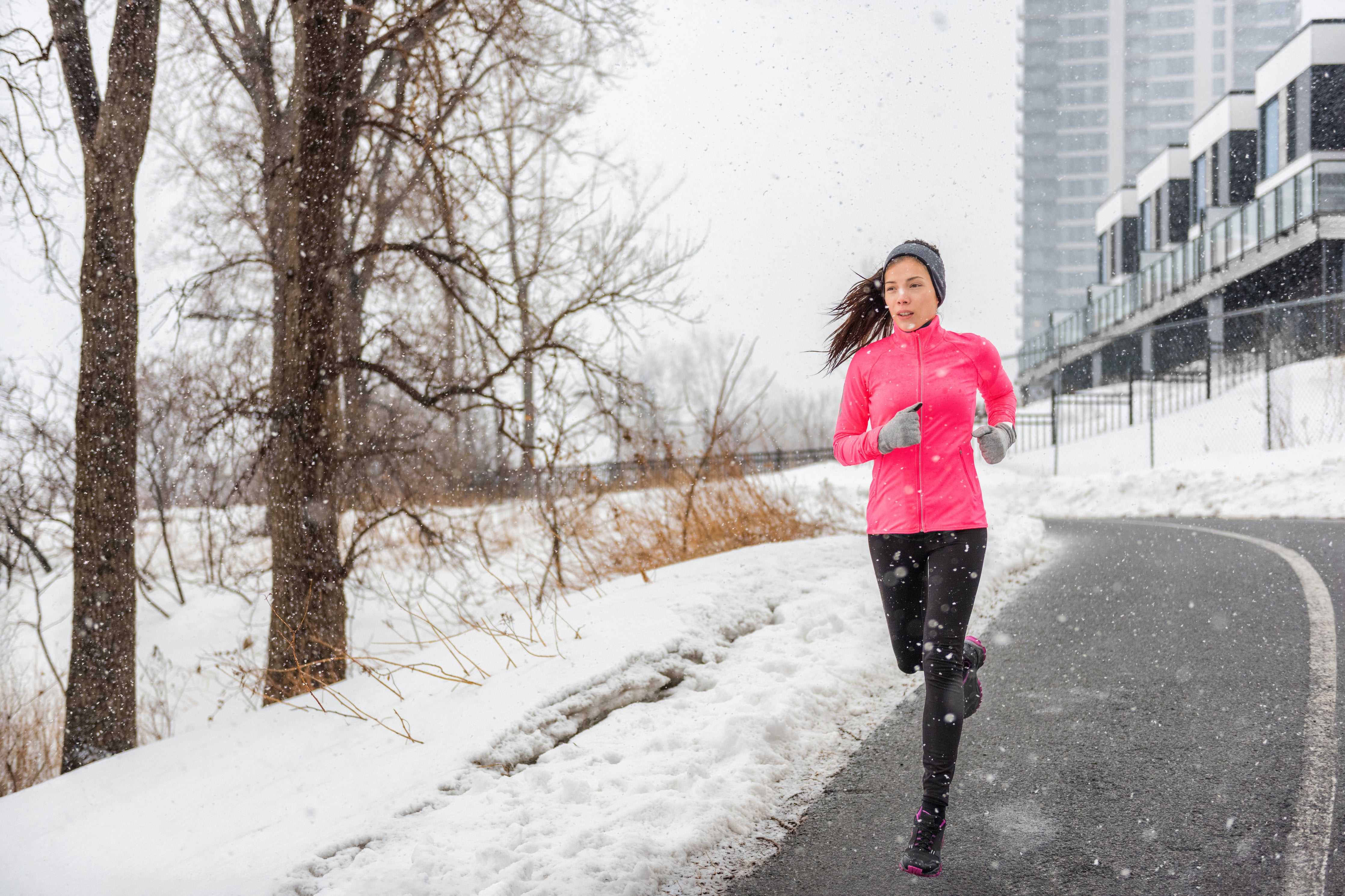 Girl running in winter