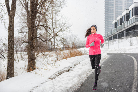 Girl running in winter